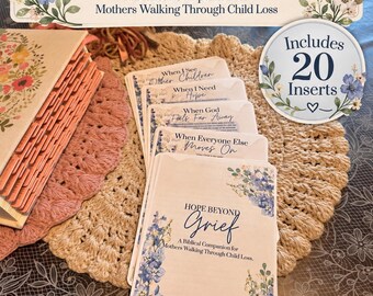 May include: A set of cards titled Hope Beyond Grief: A Biblical Companion for Mothers Walking Through Child Loss, featuring blue floral illustrations. A circular badge states Includes 20 Inserts. A book with orange tabs is visible to the left.