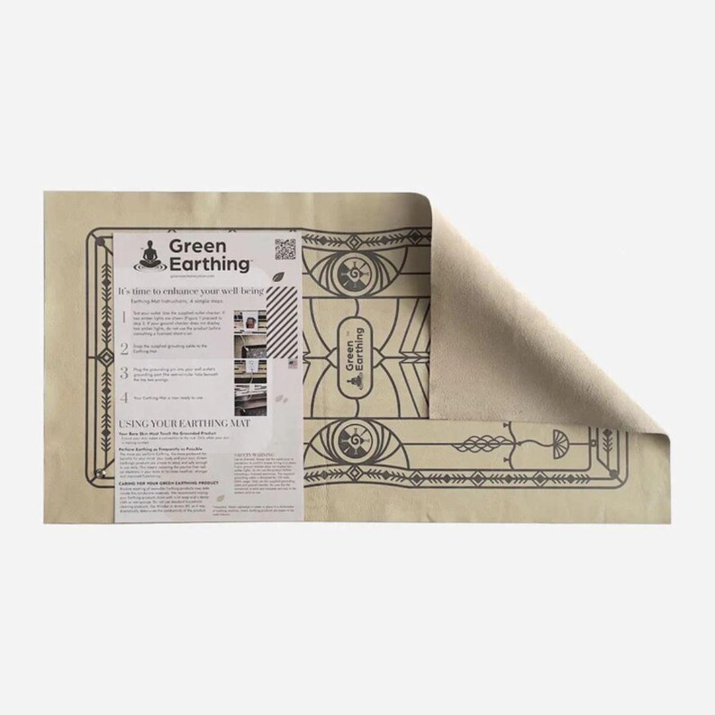 May include: A beige Green Earthing mat with a decorative border and the text "Green Earthing." The mat has a section of instructions and a QR code. The mat is partially rolled up, revealing a lighter beige underside.