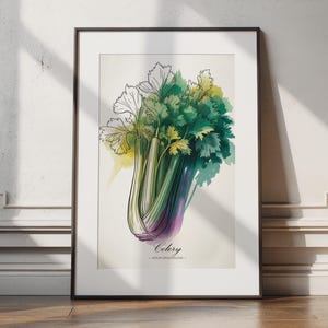 May include: A framed watercolor print of celery. The artwork features a detailed illustration of a celery stalk with green and yellow leaves, and a purple base. The word "Celery" is written in cursive below the image.