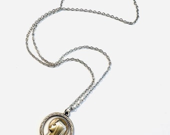 vintage religious pendant featuring a profile of the Virgin Mary, specifically associated with Our Lady of Lourdes 20”