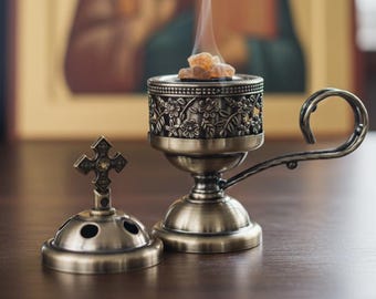 Incense burning kit: 5.1 inch metal censer, 60 grams of incense, 9 charcoal tablets.