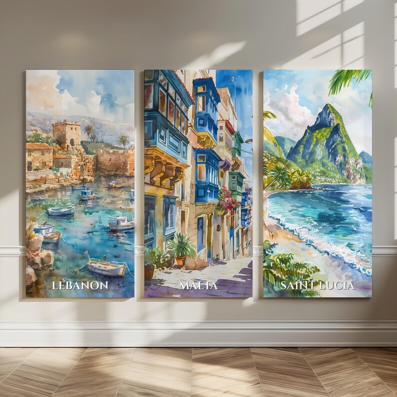 May include: A triptych of watercolor prints depicting coastal scenes. The prints feature the text "LEBANON", "MALTA", and "SAINT LUCIA". The Lebanon print shows a harbor with boats. The Malta print shows buildings with blue balconies. The Saint Lucia print shows a beach and mountain.