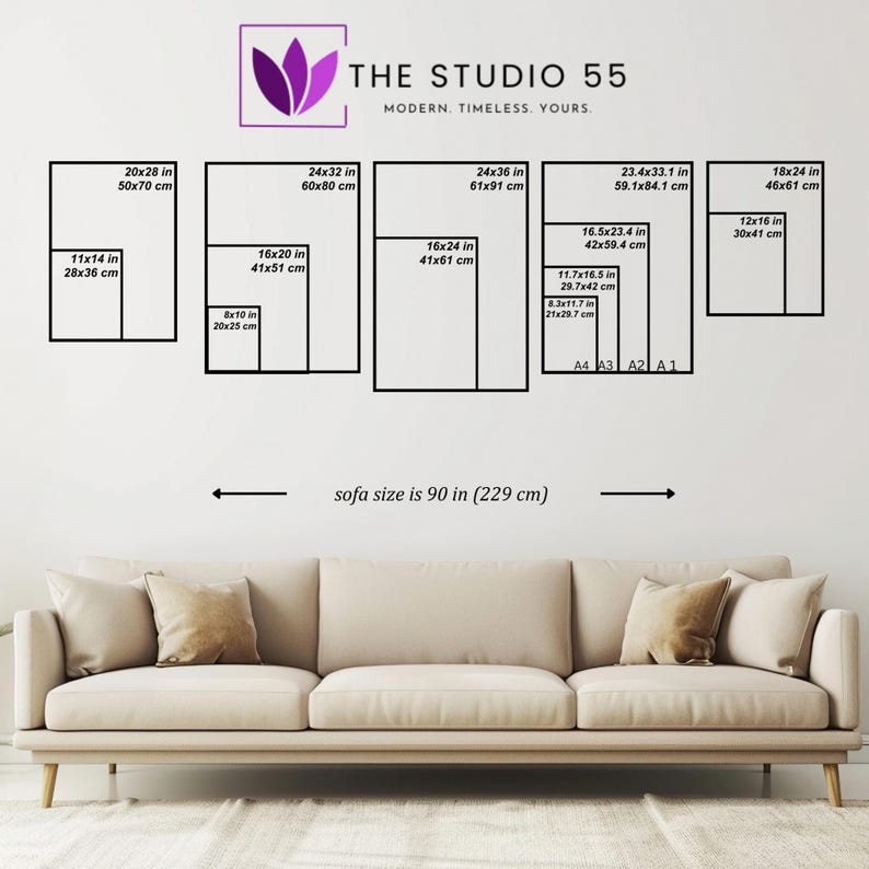 May include: A display of framed art prints in various sizes, including 11x14 inches, 16x20 inches, and 24x36 inches, against a white wall. The text "THE STUDIO 55" is at the top. The sofa size is 90 inches (229 cm).