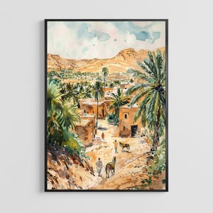 May include: Watercolor painting of a desert village with palm trees and tan buildings. The artwork depicts a sunny day with a light blue sky and a mountain range in the background. Two people are walking on a dirt road with a donkey.