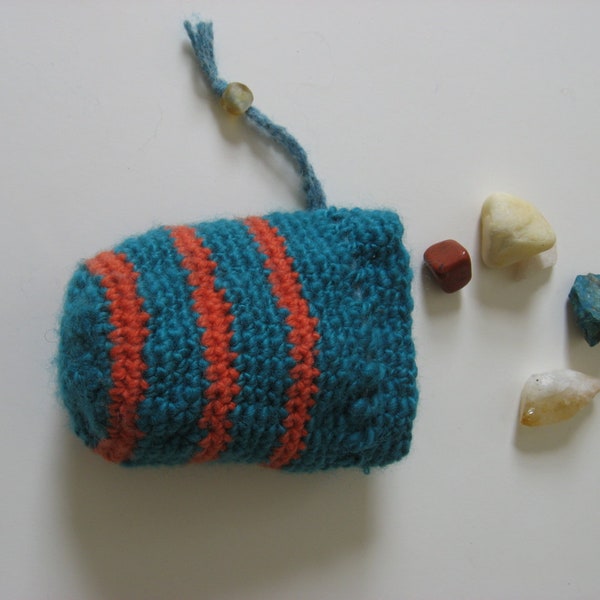 turquoise and orange dice bag