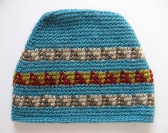 turquoise wool hat lopi with African designs