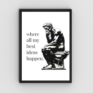 May include: Black and white framed art print featuring a graphic of a statue in a seated position on a toilet. The text on the print reads "where all my best ideas happen."