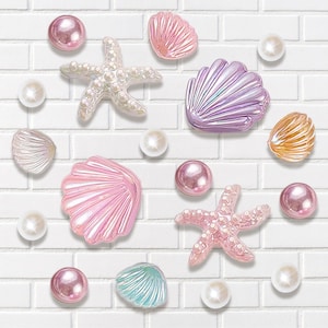 May include: An assortment of iridescent seashell and starfish decorations, along with pearl-like beads, are arranged on a white brick background. The seashells are in shades of pink, purple, and orange. The starfish are white and pink.