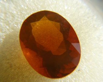 Fire Opal 4.54ct 13 x 10 faceted oval eye clean Juniper Ridge Oregon