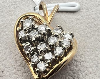 14k diamond cluster heart pendant (4.5 grams)