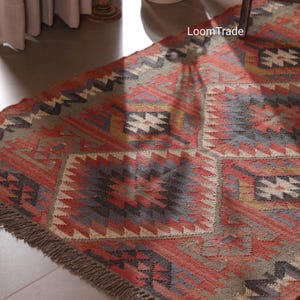 Vintage Wool Jute Kilim Rug, Handwoven, Wool and Jute Rug Handmade, Kilim Dhurrie Rug, Traditional Indian jute Area rug
traditonal kilim rug, handmade jute rug, jute rug, wool jute rug, 4x6 kilim rug, najavo kilim rug, eco friendly rug, flatweave jute rug, handwoven rug, bohemian rug, kilim carpet, multicolour rug, turkish kilim rug
