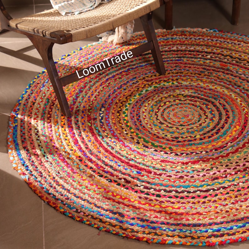 Bring warmth, texture, and sustainability into your home with this handwoven Chindi round rug, crafted by skilled Indian artisans using traditional flat-weave techniques. Made from recycled cotton rags and natural jute, this round jute rug blends rustic farmhouse charm with retro, Navajo-inspired character.Hand Braided Round Chindi And Jute Rug, Custom Size Natural Circle Jute And Chindi Rug, Living Room Decor Round Rug Entryway Circle Area Rug,chindi round rug, cotton braided rug, custom size