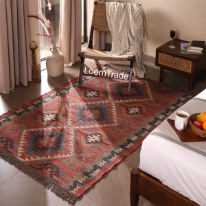 6x9 Ft Vintage Wool Turkish Kilim Rug Bohemian Carpet Jute Kilim Boho Rug Eco Friendly Living Room Rug, Kilim Dhurrie Rug, Indian Kilim Rug
handwoven jute rug, bohemian jute rug, kilim dhurrie rug, wool jute rug, southwestern rug, home decor wool, kilim area rug, large kilim rug, moroccan rug, turkish area rug, vintage kilim rug, wool kilim rug, wool rugs