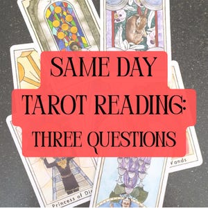 May include: Tarot cards with colorful illustrations are displayed, with a red banner overlay that reads "SAME DAY TAROT READING: THREE QUESTIONS". The cards feature images of a stained glass window, a rabbit, and other symbolic figures.