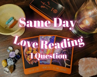 May include: A collection of tarot cards, crystals, and a candle in a glass jar. The cards are orange with illustrations and text. The image includes the text "Same Day Love Reading 1 Question".