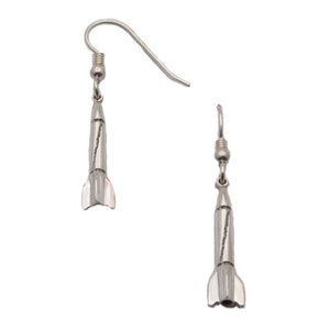 May include: A pair of silver rocket ship earrings with a hook closure.