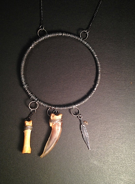 Items similar to Badger Claw, Coyote Toe Bone, and Feather Circular ...