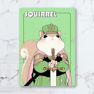 May include: A rectangular card with a cartoon squirrel illustration. The squirrel is dressed in green and pink attire and holds a sword. The word "SQUIRREL" is at the top. The background is light green with pink flower accents.