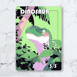 May include: A green and pink illustrated card featuring a dinosaur with the word "Dinosaur" at the top. The dinosaur is surrounded by green foliage. The card also has the word "Trample" and the numbers "3/3".