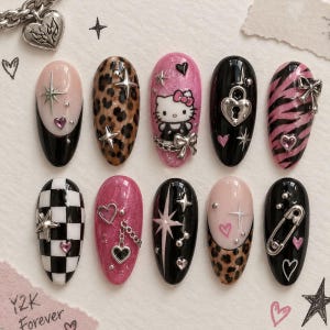 May include: A set of ten press-on nails featuring diverse designs including leopard print, black and white checkerboard, pink glitter, and a Hello Kitty character. Embellishments include silver metal charms like hearts, stars, bows, and a safety pin.