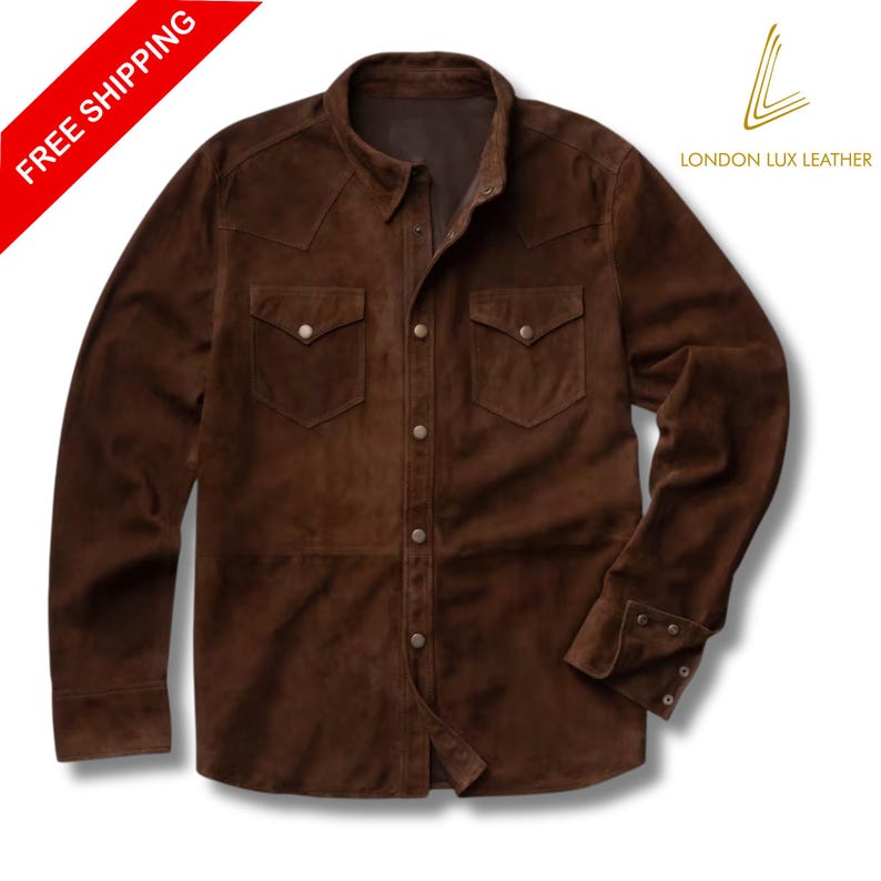 May include: A brown suede shirt with two chest pockets and button closures. The long-sleeved shirt has a classic collar and buttoned cuffs. The words "FREE SHIPPING" are in a red banner in the upper left corner. The London Lux Leather logo is in the upper right corner.