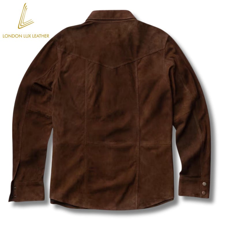 May include: A brown suede shirt with long sleeves and a button-down front. The shirt features a classic collar and a Western-style yoke design on the back. The brand logo "LONDON LUX LEATHER" is visible in the upper left corner.