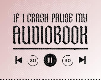 May include: A digital file with the text "IF I CRASH PAUSE MY AUDIOBOOK" in a gothic font. Below the text are media control icons: rewind, pause, fast forward, and 30-second skip buttons. The background is a gradient of pink and white.
