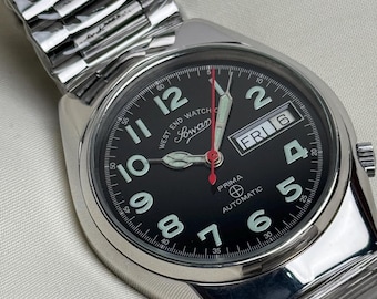 Reloj automático vintage West End Sowar Prima: fabricado en Suiza, esfera negra