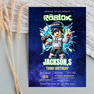 May include: A rectangular birthday invitation card with a dark blue space background featuring a Roblox character wearing a headset and holding a game controller. The text reads JOIN US TO CELEBRATE ROBLOX, JACKSON,S THIRD BIRTHDAY, 26 DECEMBER, 4:00PM-7:00PM.