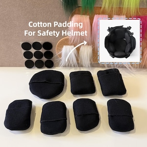 May include: An assortment of black cotton padding pieces for a safety helmet, along with a sample of the helmet's interior and adhesive circles. The text reads "Cotton Padding For Safety Helmet".
