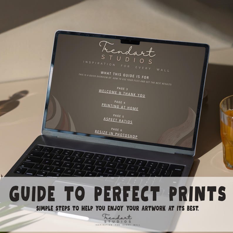 Digital download guide displayed on a laptop screen showing Trendart Studios instructions for printing high-resolution art, aspect ratios, and professional results at home.