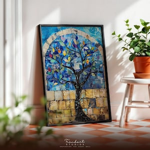 May include: Framed artwork featuring a mosaic tree with colorful leaves against a blue sky background. The tree's trunk is dark, and the leaves are a mix of colors. The artwork is framed in black and leans against a white wall.