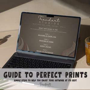 A laptop computer displaying a digital PDF guide titled Guide to Perfect Prints by Trendart Studios. This instructional material helps customers with printing at home, aspect ratios, and resizing their high-quality printable art files for best results.