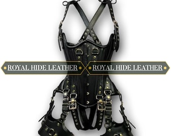 May include: Black leather corset with suspenders and leg restraints. The corset features multiple straps, buckles, and metal hardware. The text "ROYAL HIDE LEATHER" is displayed on a banner across the image. The corset is designed with a structured silhouette.