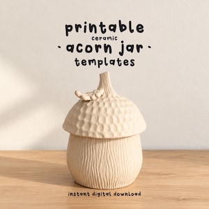 May include: A beige ceramic jar shaped like an acorn with a textured cap and a smooth, vertically lined base. The text above reads printable ceramic acorn jar templates and the text below reads instant digital download.
