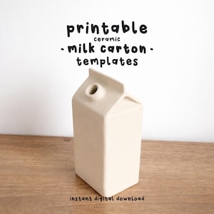 Könnte beinhalten: Eine beige Keramikvase in Form eines Milchkartons mit einer runden Öffnung oben. Der Text "printable ceramic milk carton templates" befindet sich über der Vase. Die Worte "instant digital download" stehen darunter.
