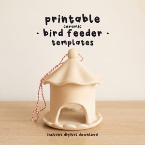 May include: A beige ceramic bird feeder with a scalloped roof and base, featuring a central arched opening. A red and white baker's twine string is attached to the top. The text reads: printable ceramic bird feeder templates instant digital download.