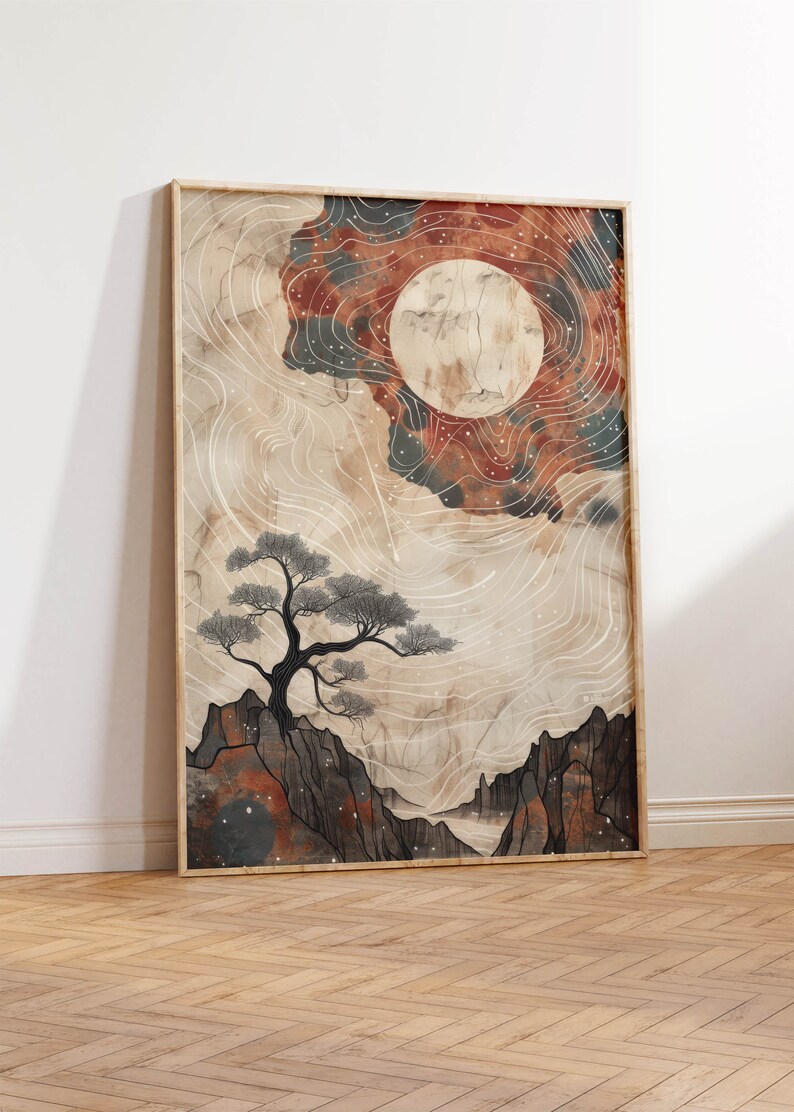 May include: A framed print of a stylized landscape with a large, pale moon in a red and blue sky. A lone tree stands on a rocky cliff in the foreground. The print has a vintage, hand-drawn aesthetic.