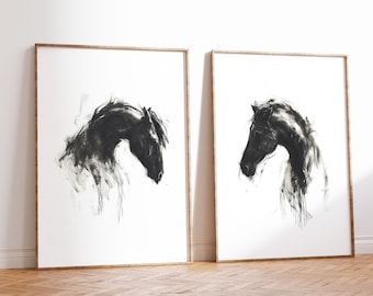 May include: A set of two black and white minimalist art prints featuring the profile of a horse's head. The prints are framed in natural wood frames.