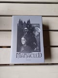 Manacled book - Limited edition product logo