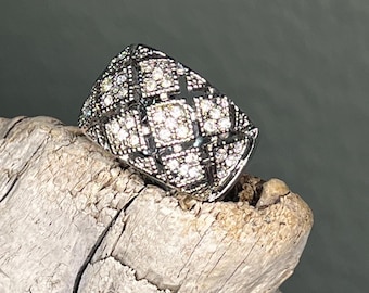 Pave crystal and silver dome ring with a wide band