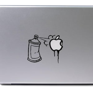 May include: A black and white sticker of a spray can spraying paint onto an apple logo. The apple logo is dripping with paint.