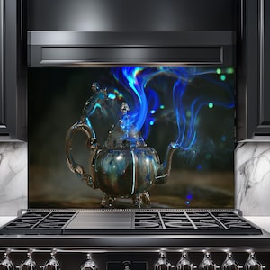 May include: A silver teapot with ornate detailing, emitting vibrant blue and green smoke, is the focal point of this kitchen backsplash. The image is set against a dark background, with a stainless steel stove in the foreground.