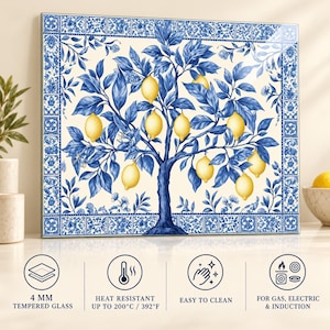 Blue lemon tree glass backsplash protected with foam corners beside a fitted shipping box and packing materials.
