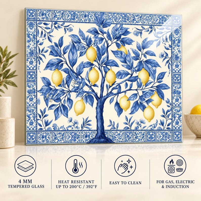 Blue lemon tree glass backsplash protected with foam corners beside a fitted shipping box and packing materials.