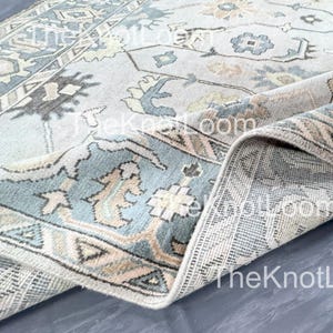 Hand-Knotted Oushak Wool Rug 8x10: Ivory, Sage Green & Blue Accents