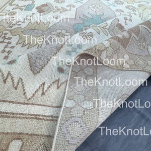 Hand-Knotted Wool Oushak Rug: Beige, Brown & Teal Accents - 9x12