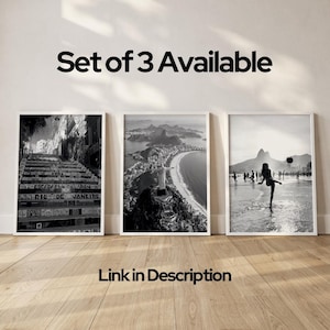 May include: A set of three framed black and white photographs. One shows a staircase with graffiti, another a coastal city, and the third a person kicking a ball on a beach. The text "Set of 3 Available" is above the frames.