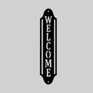 May include: Black metal welcome sign with a vertical design. The word "WELCOME" is spelled out in white, bold, capital letters. The sign has a decorative shape with rounded edges and two small holes for hanging.