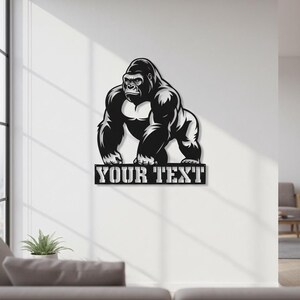 A wall decal depicting a fierce-looking gorilla, with the text "YOUR TEXT" below it.